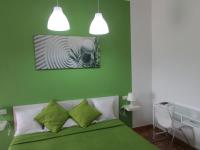 A bed or beds in a room at El Manantial