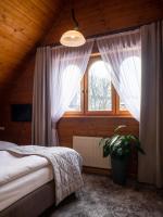 Posteľ alebo postele v izbe v ubytovaní Hotel Sabała
