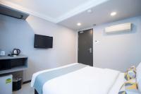 Harbour Ville Hotelにあるベッド