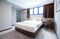 Harbour Ville Hotelにあるベッド