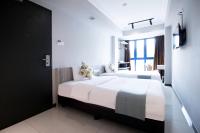 Harbour Ville Hotelにあるベッド
