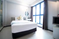 Harbour Ville Hotelにあるベッド