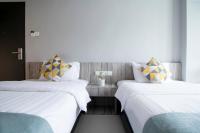 Harbour Ville Hotelにあるベッド