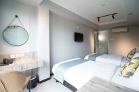 Harbour Ville Hotelにあるベッド