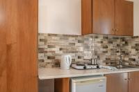 Kuchyň nebo kuchyňský kout v ubytování Georgia Apartments