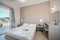 Postel nebo postele na pokoji v ubytování Georgia Apartments