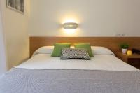 Postel nebo postele na pokoji v ubytování Hostal La Numantina