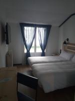Postel nebo postele na pokoji v ubytování Hotel Alda Jolio Jaca