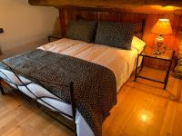 A bed or beds in a room at Casa Ferreiro - Campo da Cruz - Lugo