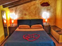 Posteľ alebo postele v izbe v ubytovaní B&B al centro storico