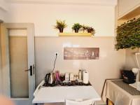 Príslušenstvo na prípravu kávy alebo čaju v ubytovaní Feels Like Home 1