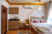 Postel nebo postele na pokoji v ubytování April Hotel