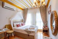 Postel nebo postele na pokoji v ubytování April Hotel