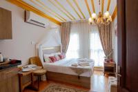 Postel nebo postele na pokoji v ubytování April Hotel