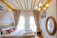 Postel nebo postele na pokoji v ubytování April Hotel