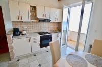 Kuchyň nebo kuchyňský kout v ubytování Apartments Šimić