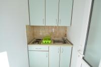 Kuchyň nebo kuchyňský kout v ubytování Apartments Šimić