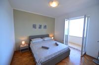 Postel nebo postele na pokoji v ubytování Apartments Šimić
