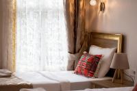 Postel nebo postele na pokoji v ubytování April Hotel