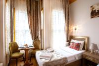 Postel nebo postele na pokoji v ubytování April Hotel
