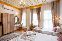 Postel nebo postele na pokoji v ubytování April Hotel