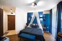 Postel nebo postele na pokoji v ubytování Sunrise Hotel