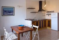 A kitchen or kitchenette at Apartamentos Vista Vedrá