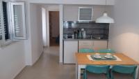 Kuchyň nebo kuchyňský kout v ubytování Apartments Nikolina
