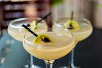 a group of three cocktails sitting on a table at Cambria Hotel Downtown Asheville in Asheville