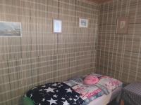 Postel nebo postele na pokoji v ubytování Dřevěnka