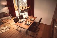 Posedenie v ubytovaní die Tauplitz Lodges - Alm Lodge A6 by AA Holiday Homes