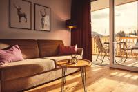 Posedenie v ubytovaní die Tauplitz Lodges - Alm Lodge A6 by AA Holiday Homes