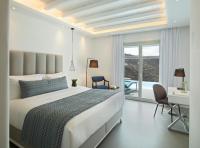 Postel nebo postele na pokoji v ubytování Epic Blue Mykonos