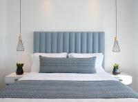 Postel nebo postele na pokoji v ubytování Epic Blue Mykonos