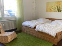 Postel nebo postele na pokoji v ubytování Ferienwohnung In den Haargärten