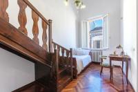 A bed or beds in a room at Palazzo 1500 Frescobaldi - Piano nobile x 5 - A Casa di Alfonso