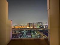 Nespecifikovaný výhled na destinaci Dubaj nebo výhled na město při pohledu z aparthotelu