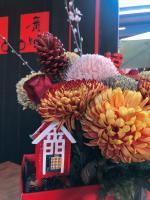 a bunch of flowers and a house and a bunch of flowers at I-Shan B&amp;B in Jincheng