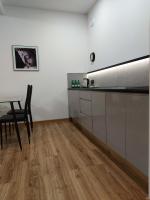 Kuchyň nebo kuchyňský kout v ubytování Apartamenty Lawendowy Zakątek 5