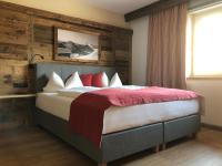 A bed or beds in a room at ArtiHome