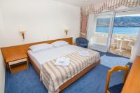Postel nebo postele na pokoji v ubytování Family Hotel Pagus - All Inclusive