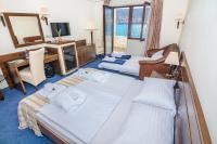 Postel nebo postele na pokoji v ubytování Family Hotel Pagus - All Inclusive