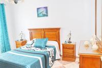 Postel nebo postele na pokoji v ubytování Apartamento Cervantes Conil II