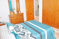 Postel nebo postele na pokoji v ubytování Apartamento Cervantes Conil II