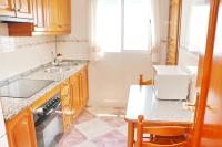 Kuchyň nebo kuchyňský kout v ubytování Apartamento Cervantes Conil II