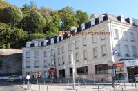 a building with a sign on the side of it at The Originals City, Hôtel Continental, Poitiers in Poitiers