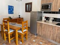 Kuchyň nebo kuchyňský kout v ubytování Banana House
