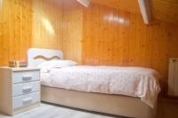 Postel nebo postele na pokoji v ubytování Atico de madera Apartamento en Rinlo, RIBADEO