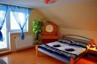 Posteľ alebo postele v izbe v ubytovaní Apartmány Riviéra a Chalupa Riviéra Liptov, Bešeňová