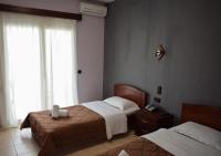 Posteľ alebo postele v izbe v ubytovaní Filippion Hotel